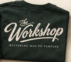 Forest green t-shirt with The Workshop script logo and Restoring men to purpose
